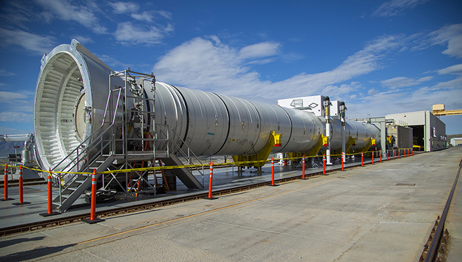A full-scale test version of the SLS solid rocket booster is on site at Orbital ATK’s Utah test facility in preparation for the upcoming Qualification Motor-2 test. Photo Credit: Orbital ATK