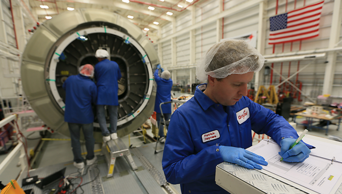 Orbital Sciences Corp. completed final cargo load of the Cygnus cargo spacecraft Oct. 23, 2014, in preparation for launch to the International Space Station. Credit: NASA