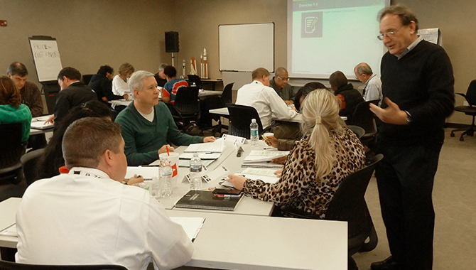 Course instructor Marek Kaszubski engages with practitioners during a pilot session of Contract Management Principles and Practices for Project Managers. Credit: NASA APPEL/Daniel Daly