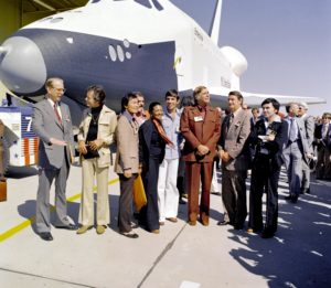 Enterprise was named after the spacecraft in the TV series Star Trek. When the shuttle prototype was unveiled to the public on September 17, 1976, attendees included members of the show’s cast. From left to right: NASA Administrator Dr. James D. Fletcher, DeForest Kelley (Dr. “Bones” McCoy), George Takei (Mr. Sulu), James Doohan (Chief Engineer Montgomery “Scotty” Scott), Nichelle Nichols (Lt. Uhura), Leonard Nimoy (Mr. Spock), Gene Roddenberry (series creator), U.S. Representative Don Fuqua (D-Fla), and Walter Koenig (Ensign Pavel Chekov).  Credit: NASA