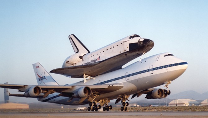 NASA’s modified Boeing 747 Shuttle Carrier Aircraft with the Space Shuttle Endeavour on top lifts off to begin its ferry flight back to the Kennedy Space Center in Florida. Photo Credit: NASA