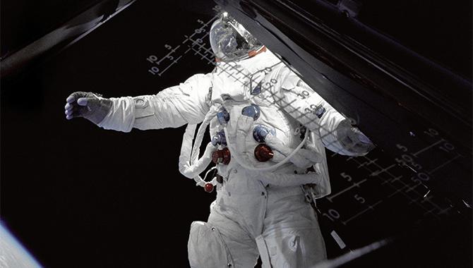 Rusty Schweickart crossing the threshold. Photo Credit: NASA