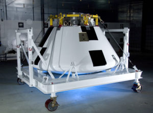 Sporting a fresh paint job, NASA's first Orion full-scale abort flight test crew module awaits avionics and other equipment installation. Credit: NASA