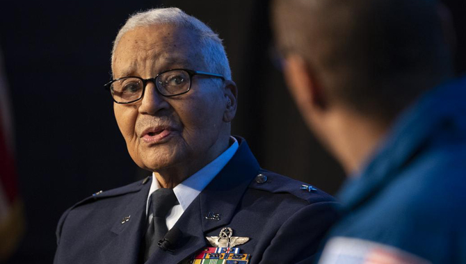 Retired U.S. Air Force Honorary Brigadier General Charles McGee, left, speaks with NASA astronaut Alvin Drew during a Black History Month program titled “Trailblazers, The Story of a Tuskegee Airman.” Credit: NASA/Joel Kowsky