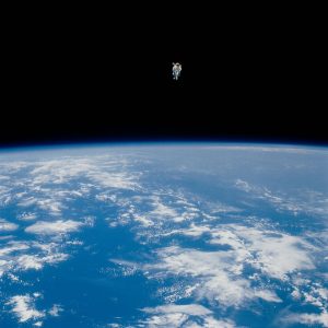 Astronaut Bruce McCandless II, 41-B mission specialist, reaches a maximum distance from the Challenger before reversing direction his manned maneuvering unit (MMU) and returning to the Challenger. Credit: NASA