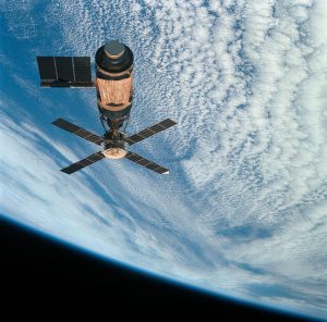 An overhead view of the Skylab space station cluster in Earth orbit as photographed from the Skylab 4 Command and Service Modules (CSM) during the final fly-around by the CSM before returning home. Credit: NASA