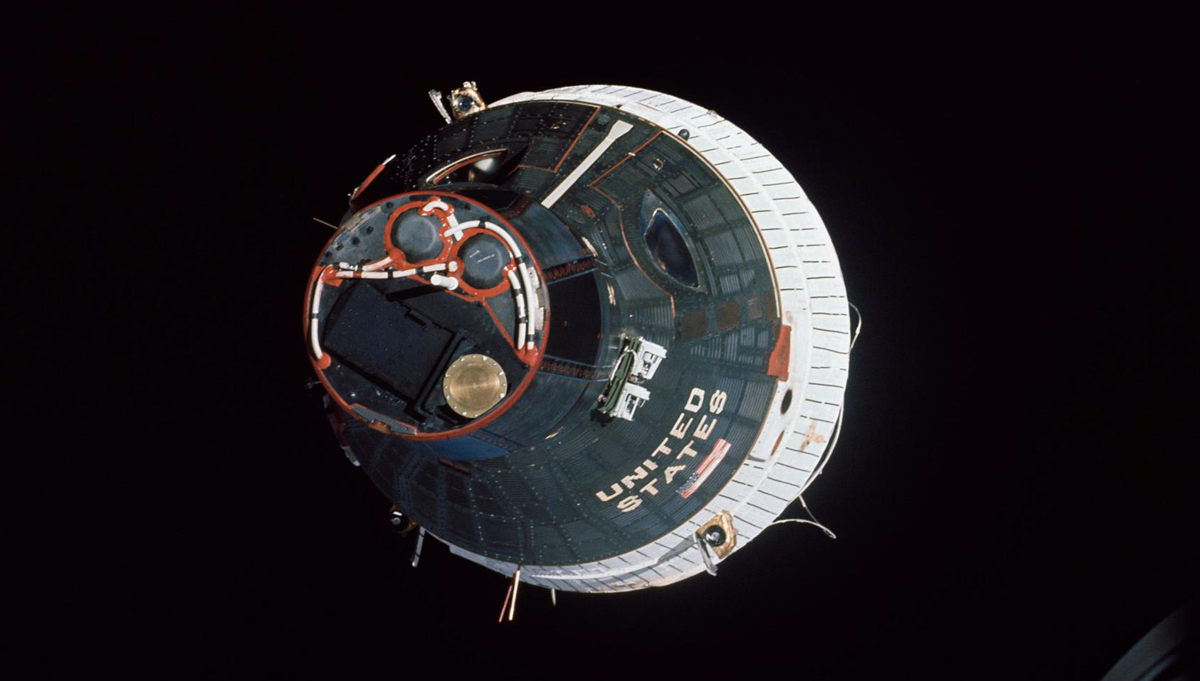 Gemini VII as seen from Gemini VI-A during the more than five hours of maneuvering the astronauts performed during the first spacecraft rendezvous. The two spacecraft are approximately 43 feet apart at this point, eventually closing to about one foot apart. Credit: NASA