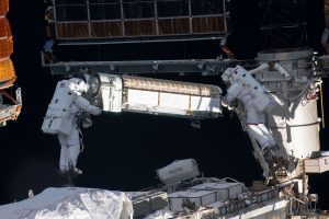Spacewalkers (from left) Shane Kimbrough and Thomas Pesquet work to install new roll out solar arrays on the International Space Station's P6 truss. Credit: NASA