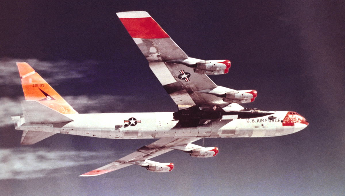 An NB-52 mothership carries an X-15 aloft for a research flight on April 13, 1960, Maj. Gen. Robert M. White's first flight in the hypersonic rocket plane. The X-15s reached speeds well beyond 4,000 mph and altitudes that qualified eight pilots for astronaut wings. Credit: NASA