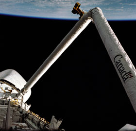 On STS-2, Engle and Truly tested the Canadarm (Remote Manipulator System) for the first time in space. Credit: NASA