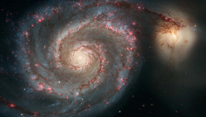 This spiral galaxy, M51, also known as the Whirlpool Galaxy, has come into much sharper focus as centuries of innovation in telescopes has revealed increasing levels of detail. Credit: NASA