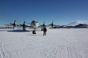 NASA’s P-3 research aircraft, shown here during engine startup on a separate mission near Mount Erebus, gathers data for the IMPACTS project by flying through powerful snowstorms.<br /> Credits: NASA / George Hale