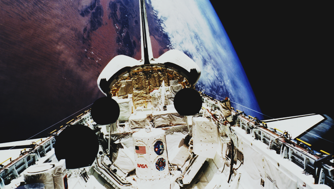 The Space Shuttle Atlantis carried the Atmospheric Laboratory for Applications and Science (ATLAS-1) module in its cargo bay in March 1992 during the STS-45 mission. The ATLAS-1 instruments are back dropped against the Atlas Mountains and dunes in the Iguidi Dune Sea near Mali in the western Sahara. Credit: NASA