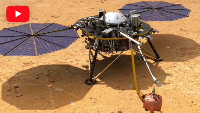 "Video Feature banner showing the InSight Mars lander drilling a hole in the soil. Credit: NASA