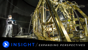 NASA photographer Desiree Stover shines a light on the Space Environment Simulator's Integration Frame, which was used to enclose and help cryogenic (cold) test the heart of the James Webb Space Telescope, the Integrated Science Instrument Module. Credit: NASA