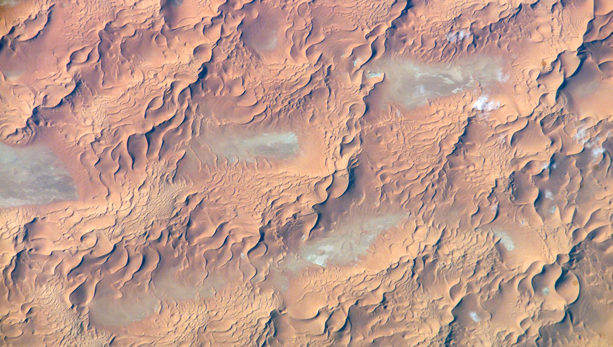 Issaouane Dune Sea, Eastern Algeria is featured in this image photographed by an Expedition 13 crewmember on the International Space Station on August 8, 2006. Credit: NASA