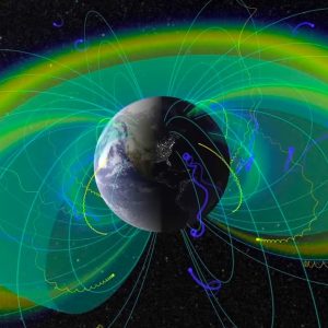 This is an illustration if Earth and its magnetic field, colored in bright green and yellow. Credit: NASA