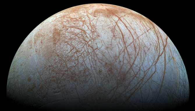 Jupiter’s moon Europa fascinates scientists searching for life in the solar system because evidence indicates it holds a massive ocean beneath surface ice that is miles thick. This image of Europa was taken by NASA's Galileo spacecraft in the late 1990s. Credit: NASA