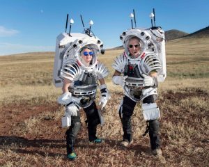 NASA astronauts Zena Cardman and Drew Feustel wearing mockup spacesuits after performing an engineering test run before a week of simulated moonwalks. Credit: NASA/Bill Stafford