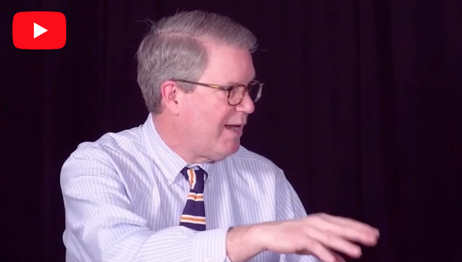 Screenshot of Terry O'Malley speaking and gesturing with his hand during his interview. Credit: NASA