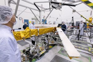 Members of the international Surface Water and Ocean Topography (SWOT) mission test one of the antennas for the Ka-band Radar Interferometer (KaRIn) instrument in a clean room at NASA's Jet Propulsion Laboratory in Southern California. Credits: NASA/JPL-Caltech
