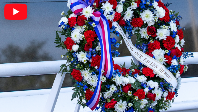 A wreath is displayed during the NASA Day of Remembrance ceremony at the Space Mirror Memorial in the Kennedy Space Center Visitor Complex. Credit: NASA