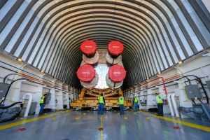 Teams rolled out, or moved, the completed core stage from NASA’s Michoud Assembly Facility in New Orleans to the barge in preparation for the SLS rocket’s core stage Green Run test series at Stennis. Credit: NASA/Eric Bordelon 