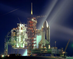 Space shuttle Columbia was lit up at Launch Pad 39A on the night of 5 March 1981 as preparations for its maiden voyage, the STS-1 mission, were being made. Photo Credit: NASA