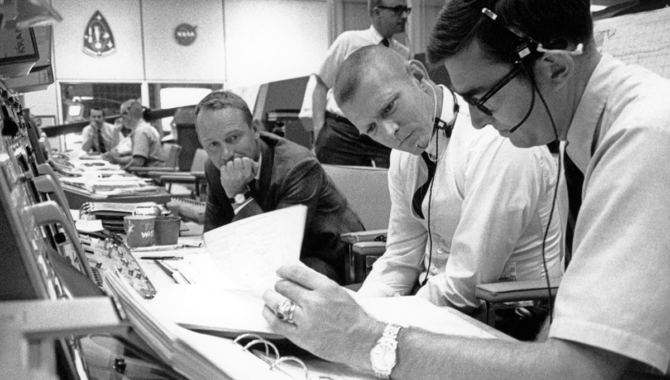 Bill Tindall (left) and Gene Kranz in Mission Control during Apollo 11. Credit: NASA