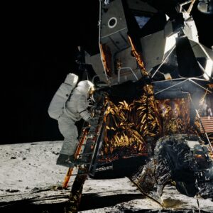 Alan L. Bean, lunar module pilot for Apollo 12, is about to step off the ladder of the Lunar Module (LM) to join Charles Conrad Jr., mission commander, on the lunar surface. The Apollo astronauts faced challenges living and sleeping in the small crew quarters of the LM. Photo Credit: NASA