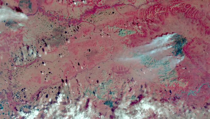 Within days of the launch, Landsat 1 acquired an image of an astounding 81,000-acre fire burning in isolated, central Alaska. For the first time ever, scientists and resource management officials were able to see the full extent of damage from a fire in a single image while it was still burning. Photo Credit: NASA/USGS