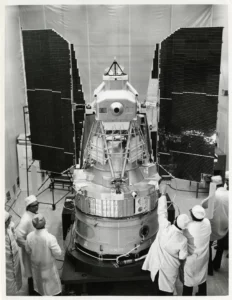 Landsat is shown in flight configuration with solar panels deployed after tests at the G.E. Valley Forge Plant. Photo Credit: NASA