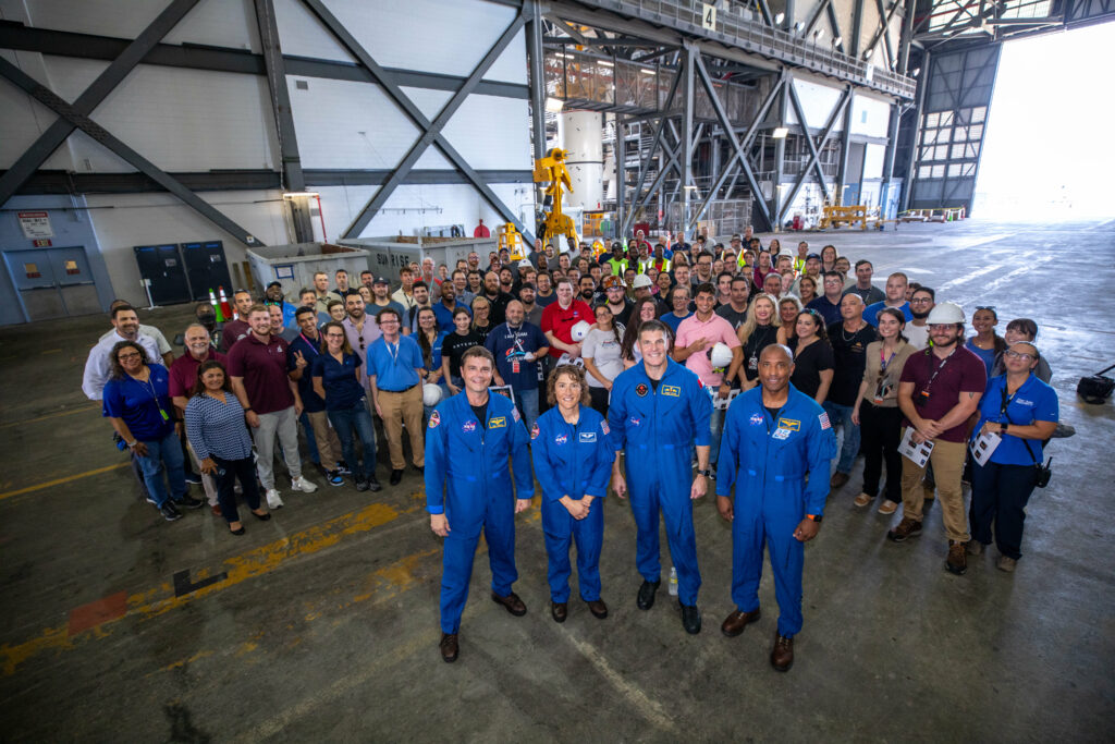 Artemis II astronauts visit NASA’s Kennedy Space Center in Florida on Aug. 7, 2023. In front, from left, are NASA astronauts Reid Weisman and Christina Koch, CSA (Canadian Space Agency) astronaut Jeremy Hanson, and NASA astronaut Victor Glover in the transfer aisle of the Vehicle Assembly Building. Behind them are Exploration Ground Systems team members. Photo Credit: NASA/Kim Shiflett