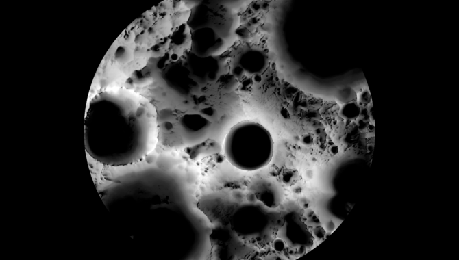 In this multi-temporal illumination map of the lunar South Pole, Shackleton crater is in the center, surrounded by larger craters and rugged terrain. The map was created with images from NASA's Lunar Reconnaissance Orbiter. Photo Credit: NASA/GSFC/Arizona State University