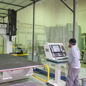 A worker at the sheet metal shop. Photo Credit: NASA/Tom Tschida