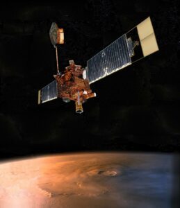 An artist concept of NASA Mars Global Surveyor (MGS) flying over Mars.  Graphic Credits: NASA/JPL-Caltech