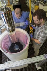 John Hood, right, an Engineering Technician at NASA’s Marshall Space Flight Center, works on X-ray mirror replication and shell separation. Photo Credit: NASA/Emmett Given