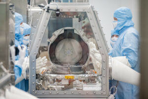 OSIRIS REx Asteroid Sample Return lid opening at Building 31 Astromaterials Curation Facility. Photo Date: September 26, 2023. Location: Bldg. 31 - OSIRIS REx Thin Section Lab. Photo Credit: Robert Markowitz