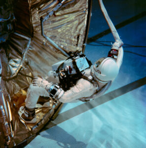 Astronaut Edwin E. Aldrin Jr., pilot for the Gemini-12 spaceflight, prepares to take a rest position during underwater zero-gravity training. His feet are secured to a mock-up of the adapter section of the spacecraft by a special foot plate. The underwater environment closely simulates the zero-gravity condition found in space. Photo Credit: NASA