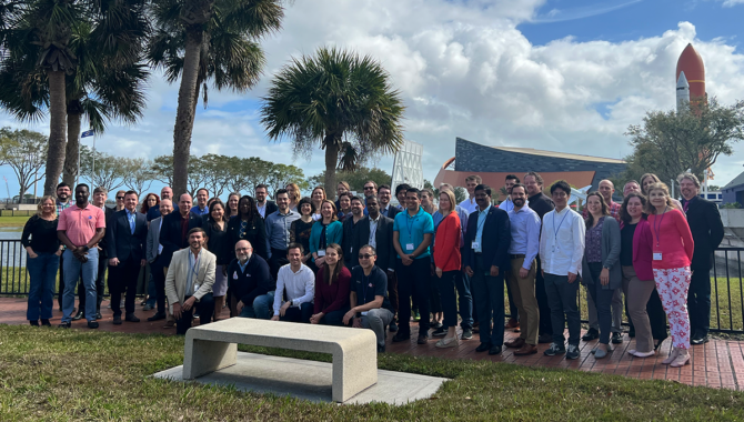 Participants in NASA’s February 2023 International Project Management course pose for a group photo at the Kennedy Space Center Visitor Complex in Florida. Photo Credit: NASA/Daniel Connell