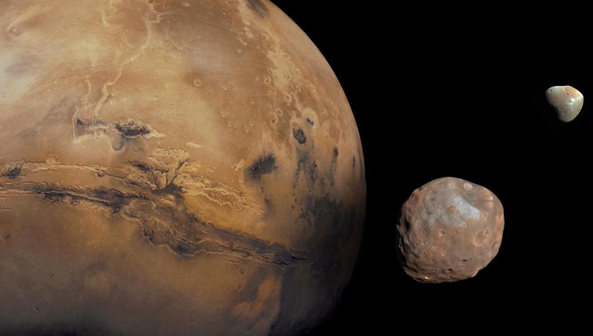Mars is kept company by two cratered moons – an inner moon named Phobos and an outer moon named Deimos. Credit: NASA/JPL-Caltech/GSFC/Univ. of Arizona