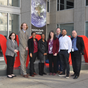 Left to right: Tiffany Smith NASA Chief Knowledge Officer, Charles Hunt from the Office of the Chief Financial Officer, Akosua A. Taylor CPMO support (detail), Adrienne Ross CPMO Executive Assistant, Ellen Stigberg CPMO support, Justin Hornback CPMO support (detail), Kevin Gilligan CPMO support, and Chief Program Management Officer (CPMO) Dave Mitchell. Not Pictured: Tracy Osborne OCE support, Mary Skow OSMA support. Credit: NASA