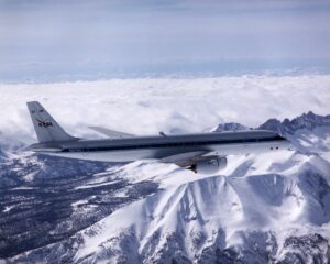 NASA's DC-8 Airborne Laboratory during a flight over the snow-covered Sierra Nevada Mountains. Photo Credit: NASA/Jim Ross