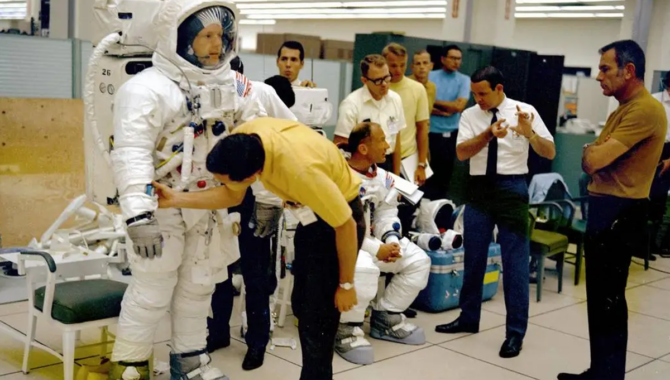 In June of 1969, Neil Armstrong and Edwin “Buzz” Aldrin prepare to practice spacewalk techniques, walking over a simulated lunar surface in a facility at what is now NASA’s Johnson Space Center. Photo Credit: NASA