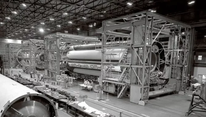 In January 1961, engineers at NASA’s Marshall Space Flight Center prepared the massive first stage of the Saturn I rocket for checkout. The booster was designed with eight clustered H-1 engines capable of producing as much as 1.5 million pounds of thrust. Credit: NASA