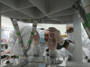 Engineers in a clean room at NASA's Jet Propulsion Laboratory in Southern California build the nadir deck for NASA's Europa Clipper spacecraft. The success of large missions, such as Europa Clipper, rely on high-performing teams and effective knowledge management. Credits: NASA/JPL-Caltech