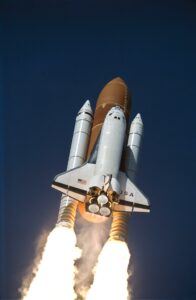 A low-angle view captures early stages of the sixteenth launch of Space Shuttle Columbia on March 4, 1994. Credit: NASA 