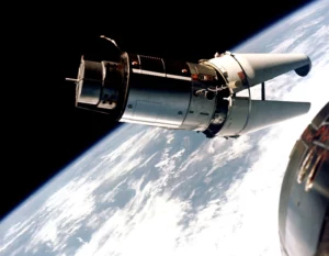 The Augmented Target Docking Adapter, or ATDA, as seen from the Gemini IXA spacecraft during one of their three rendezvous in Earth orbit. Failure of the docking adapter protective cover to fully separate on the ATDA prevented the docking of the two spacecraft. As a result, command pilot Tom Stafford described the ATDA as looking like an “angry alligator.” Credit: NASA